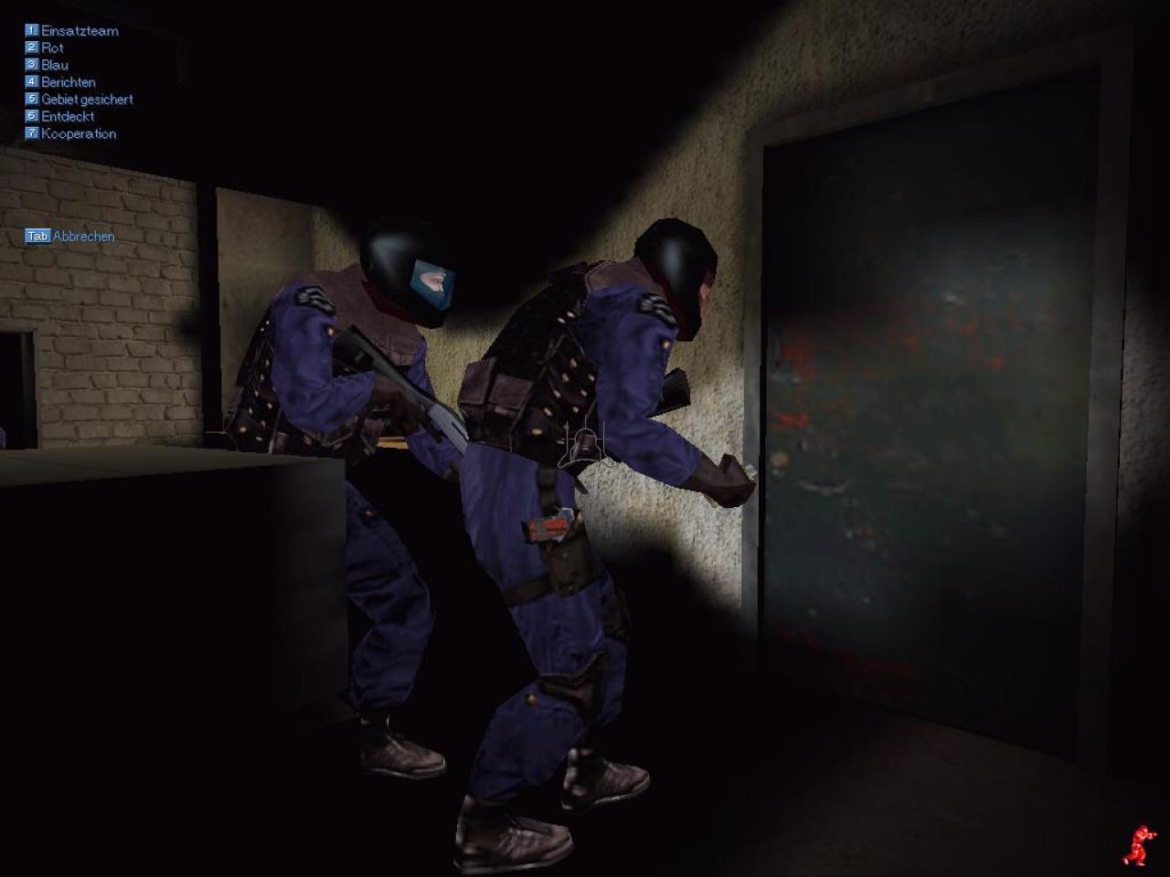 [26/11/2001] TEAMWORK Während der Polizist rechts schon die "Flash Bang"-Blendgranate in der Hand hält, gibt ihm sein Kollege Deckung für die Erstürmung des Raums.